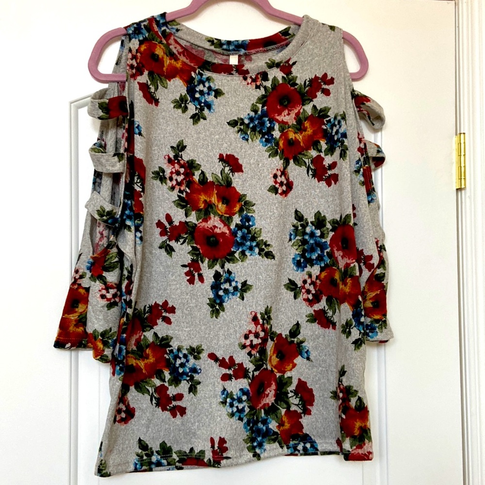 Floral top with cold shoulder style in size M